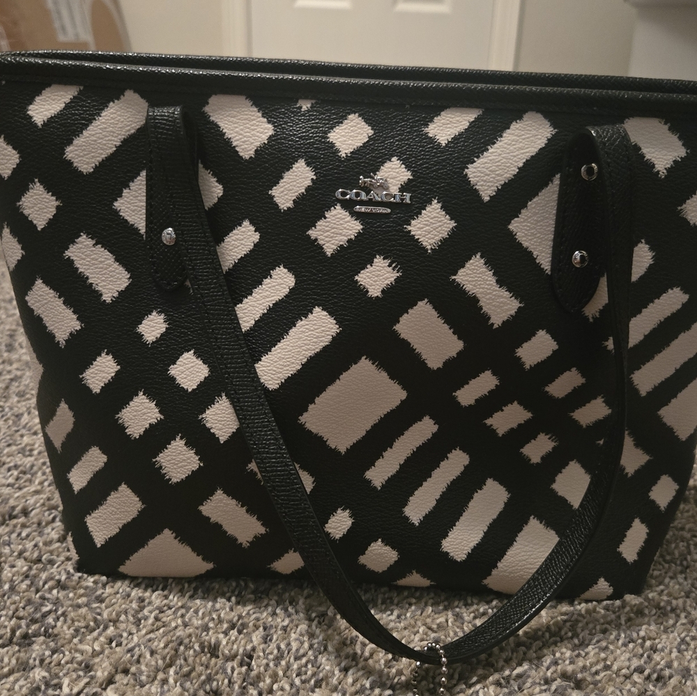 Coach purse, black and white. Used but in good condition.